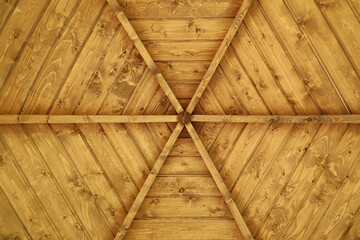 Wooden ceiling surface arbor in form of rays pattern flat lay