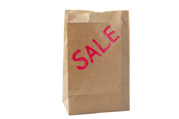 package of kraft paper with red inscription SALE. concept of sales and gifts.