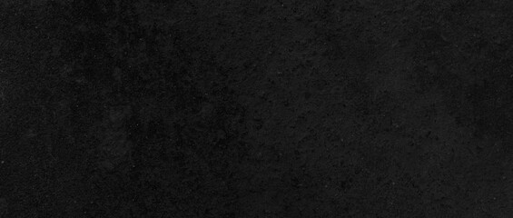 Panorama of Dark grey black slate background or texture. Black granite slabs background