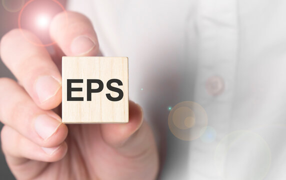 Man holding eps word on wooden cube.