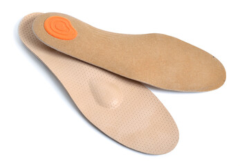 A pair of orthopedic insoles. Isolated on white background