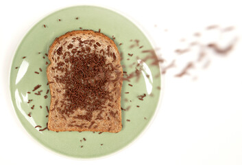 Typical dutch chocolate sprinkles falling (hagelslag)