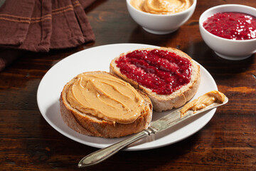 smooth peanut butter and jam bread toast, american traditional sandwich