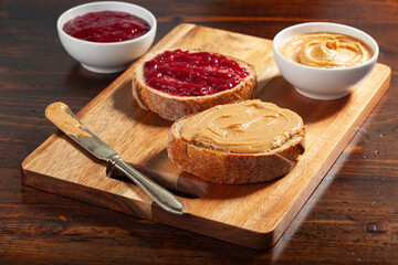 smooth peanut butter and jam bread toast, american traditional sandwich
