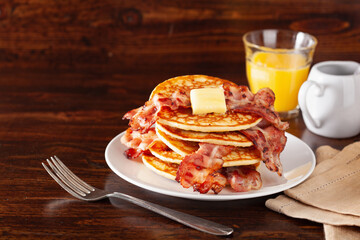 sweet bacon pancakes with butter. traditional american breakfast