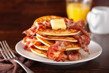 sweet bacon pancakes with butter. traditional american breakfast