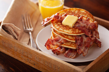 sweet bacon pancakes with butter. traditional american breakfast