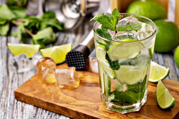 Mojito cocktail with lime, mint and ice
