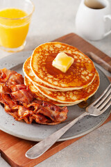 sweet pancakes with butter and bacon. traditional american breakfast