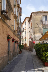 one of the narrow, picturesque street in Tropea, very popular touristic town in Calabria, Italy