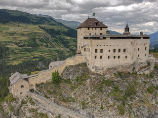 Fototapeta na wymiar Drone view at Tarasp castle in the Swiss alps
