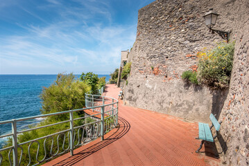 Fototapeta premium View of the beautiful promenade of Nervi in Genoa, with palm trees and bricks, Italy.
