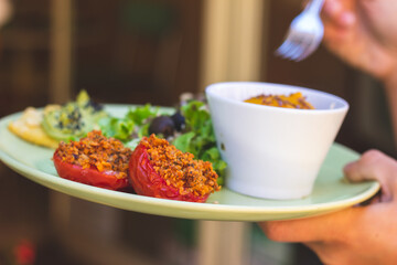 Delicious and healthy vegan food with grilled tomatoes