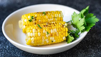 corn grilled corncob tasty food meal snack copy space food background rustic. top view keto or paleo diet veggie vegan or vegetarian food