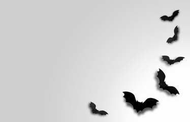 Black Halloween creepy bats with space for text or images on a gray gradient background