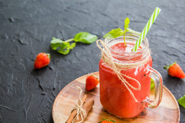 Healthy smoothie of fresh summer berries. Creative atmospheric decoration