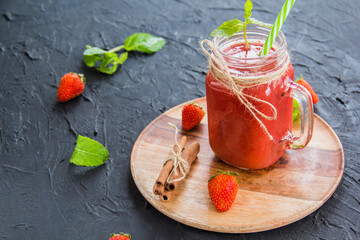 Healthy smoothie of fresh summer berries. Creative atmospheric decoration