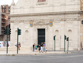 Rome Street View with San Girolamo dei Croati White Church Facade, Traffic Lights and People