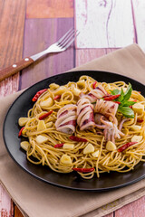 Spaghetti with spicy squid