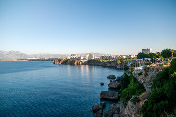 Fototapeta na wymiar Sea and city view from the cliffs of Antalya.
