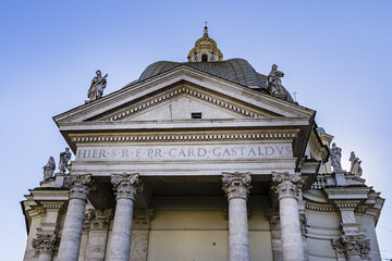 Fototapeta na wymiar Our Lady at Montesanto church (Chiesa di Santa Maria in Montesanto, 1675) - Catholic Renaissance style church on Piazza del Popolo in Rome. ROME, ITALY. 
