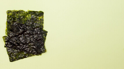 Crispy Dried Seaweed Japanese Snack Banner Copy Space Green Background