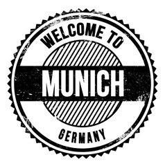 WELCOME TO MUNICH - GERMANY, words written on black stamp