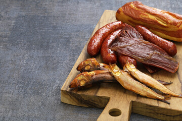 homemade smoked foods; bacon, sausage, beef jerky, fish