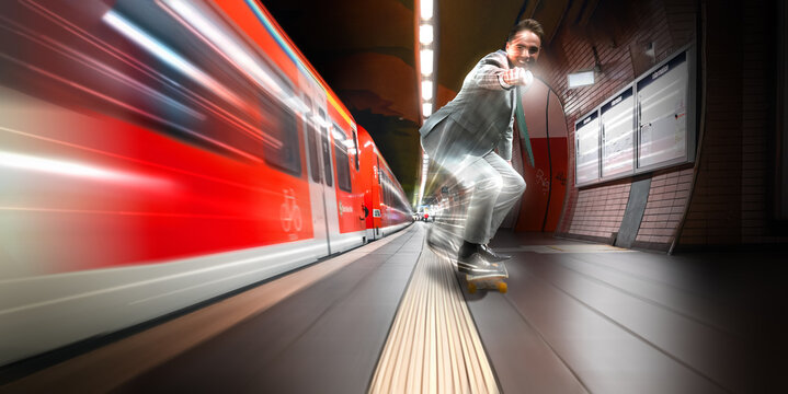 Young Business Man Riding Skateboard Fast Next To Subway On His Way To Work