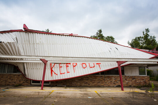 Building With Roof Collapsed And Keep Out Spray Painted