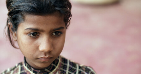 Sad young girl from India