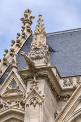 Fototapeta premium Architectural fragments of Sainte-Chapelle (Holy Chapel, 1379) in Vincennes. Vincennes (6.7 km from Paris), Val-de-Marne department, France.