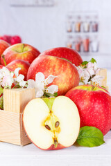 Apples fruits red apple fruit in a box with leaves portrait format