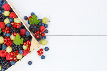 Naklejka na ściany i meble Berries fruits berry fruit strawberries strawberry blueberries blueberry with copyspace copy space in a box
