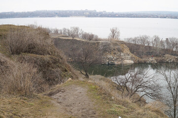 Autumn view of a granite quarry in Starye Kodaks in the Dnieper.