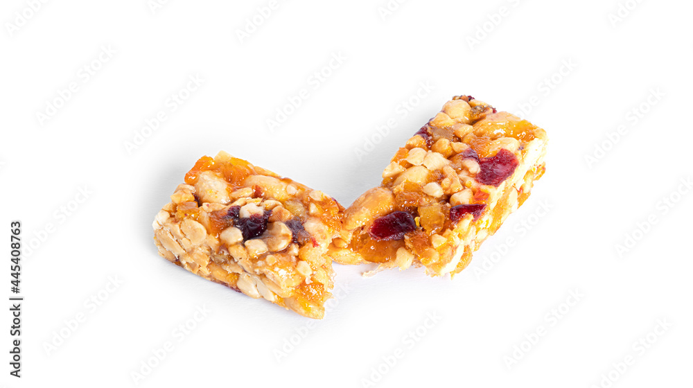 Wall mural Granola bar with nuts and dried fruits isolated on a white background.