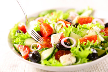 fresh mixed vegetable salad in bowl
