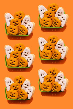 Pattern of baskets filled with Halloween themed cookies