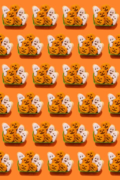 Pattern of baskets filled with Halloween themed cookies