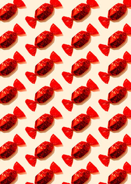 Pattern of rows of red wrapped candies