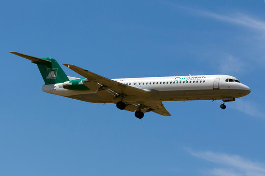 Luqa, Malta - June 9, 2016: Carpatair Fokker 100 (F-28-0100) [YR-FKA] on finals runway 31, arriving from Nice, France.