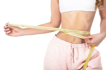 Woman with measuring tape. Weight loss concept. Woman take waist scale tape show her thin waist....