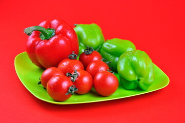 Bulgarian peppers on a green plate