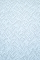 White decorative plastic surface covered with small hexagons close