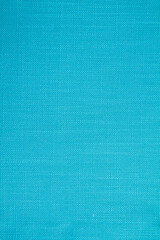 Dlue sky color fabric background with a small round rib. Cotton fabric with a simple pattern