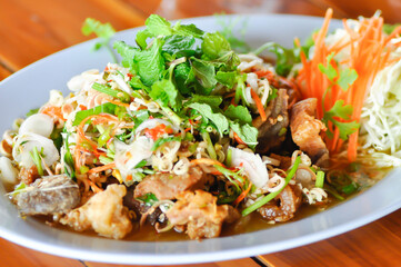 spicy salad or pork salad, fried fish salad