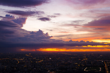Colorful of sky and cloud in sunset,and twilight,with cityscape in the evening