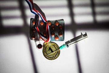 Champion gold medal, doping substance syringe, pill tablet and prohibited substance vial with...