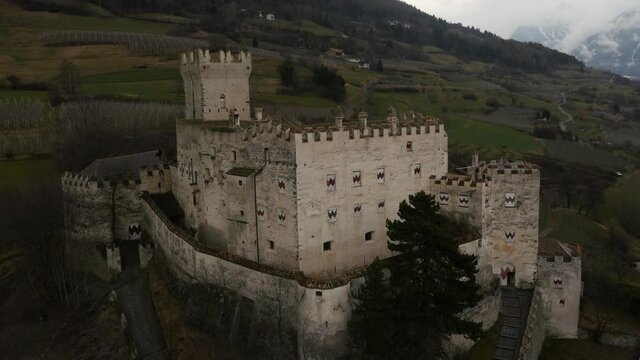 Aerial drone footage view of medieval Castle Coira in Sluderno Bolzano Italy // no video editing