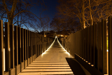 infinity bridge with lights on the ground